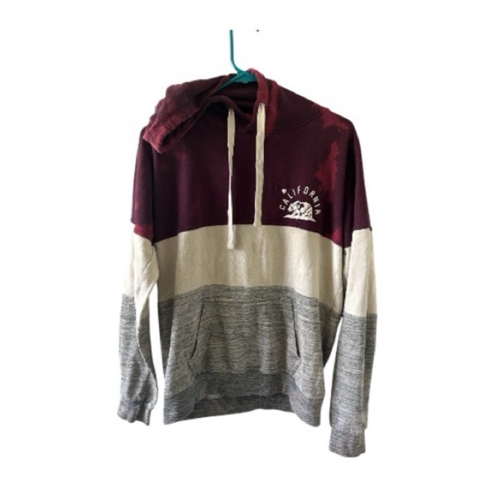 Reflex brand pullover hoodie in a woman’s size Medium.